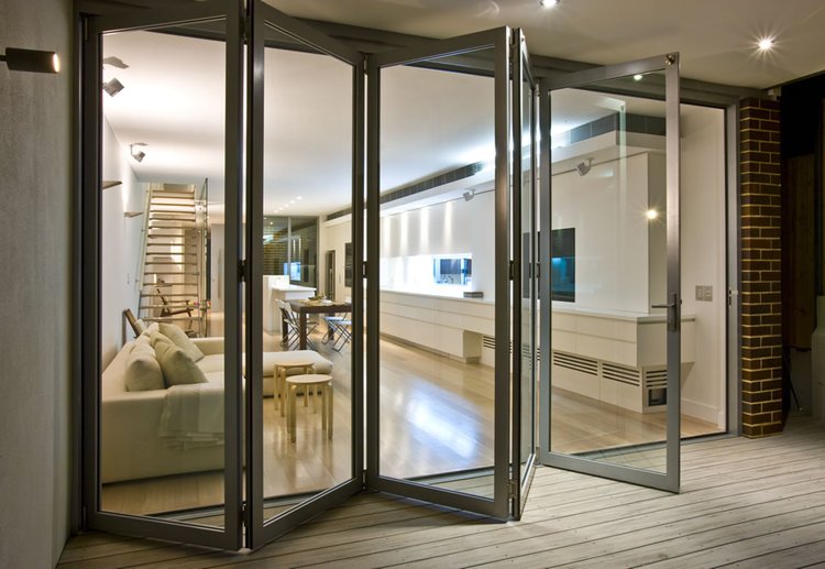 Bifold doors - convenient and chic, bringing natural light and a touch of sophistication to your home.