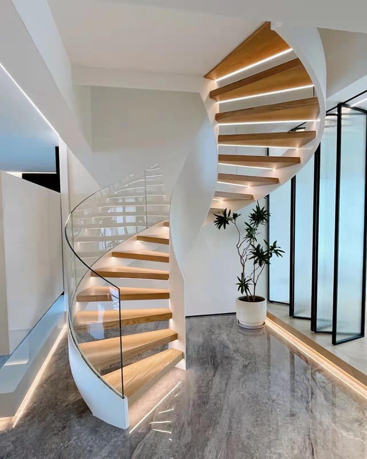 Penthouse Helical Staircase with Frameless Glass Railing and Led lighting