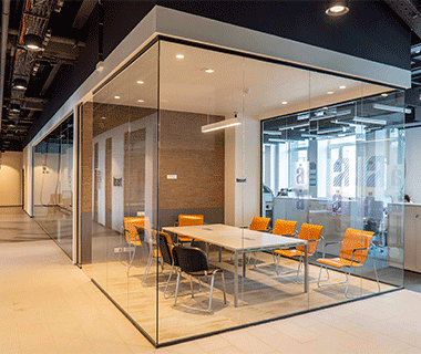 Frameless glass partitions in UAE - Enhancing interiors with a seamless look.